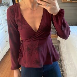 Pretty deep V wrap peplum blouse